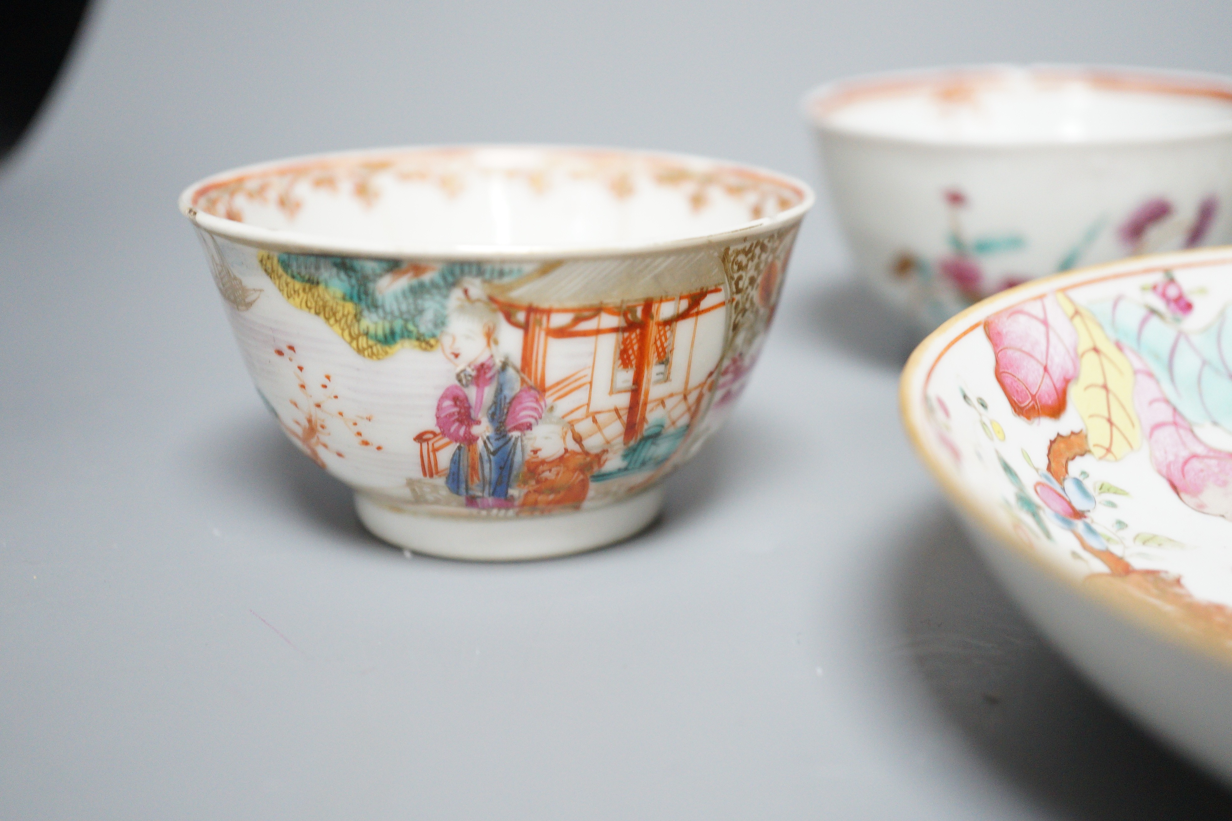 A 19th century Chinese Tobacco Leaf pattern saucer and four various teabowls